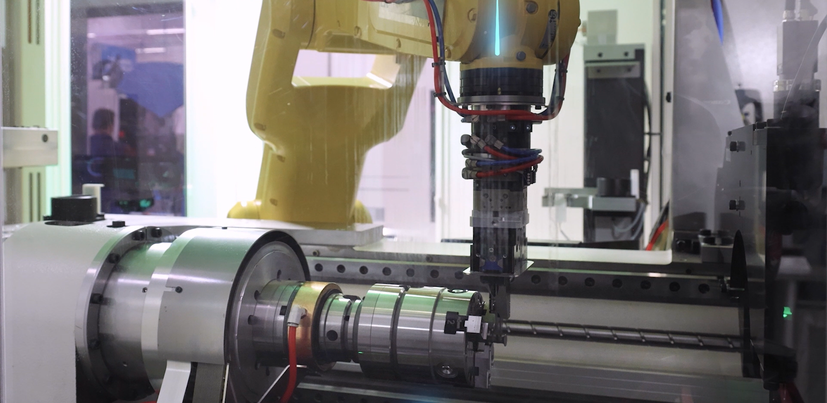 Automated raw part loading, followed by measurement for calibration and routing to the machining module.