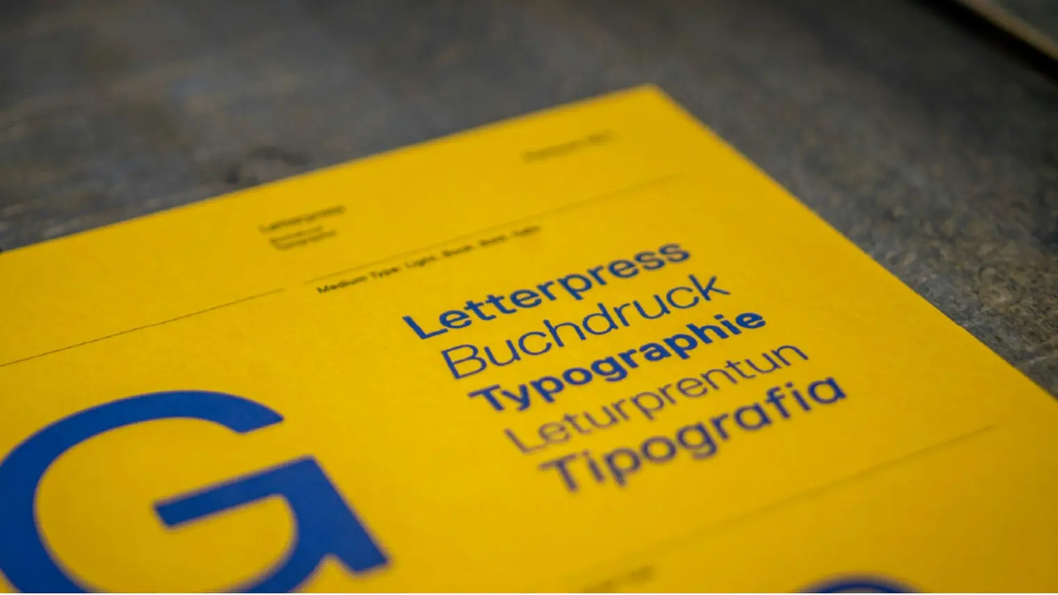 Picture of a yellow cover magazine with phrases using different typography