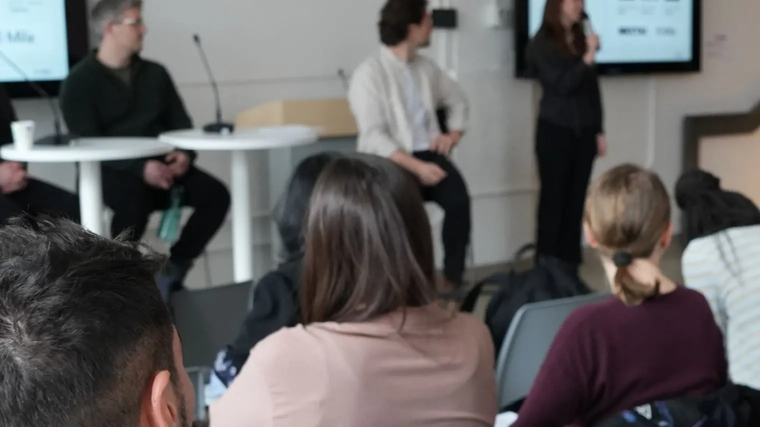 Picture of people attending a panel of experts