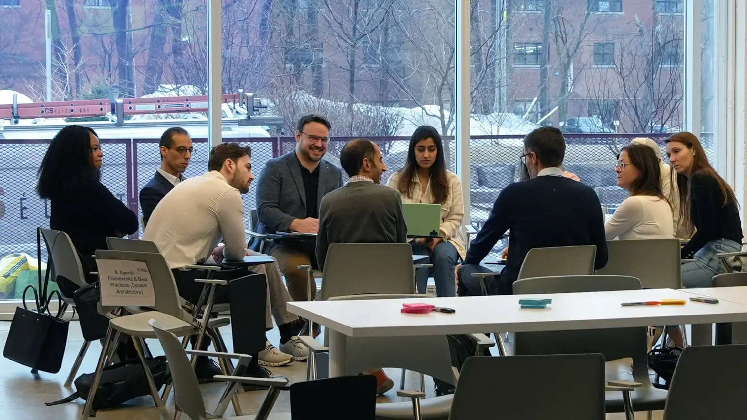 A group of people talking during an event.