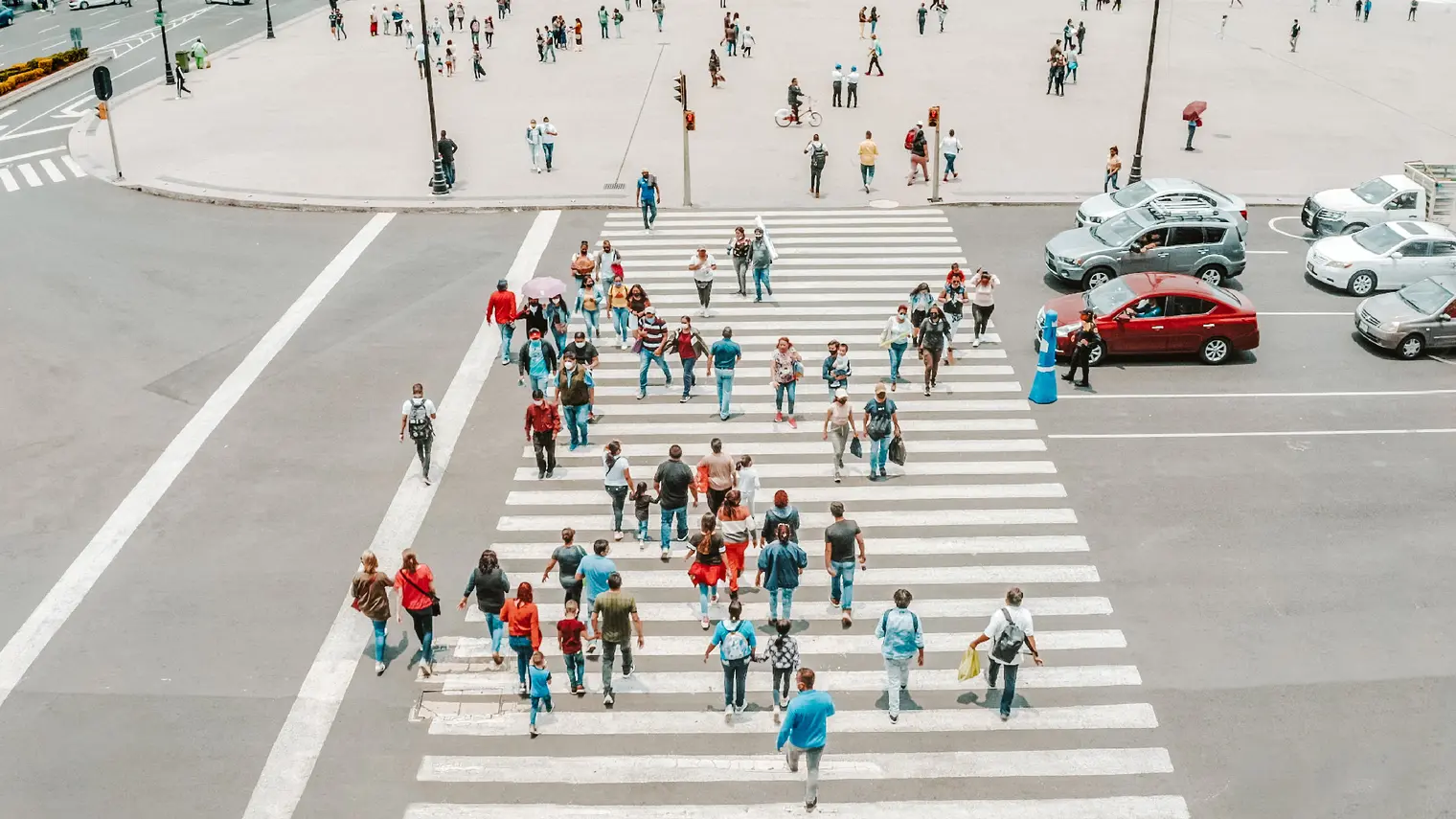 Aerial view of a crowd crossing the street