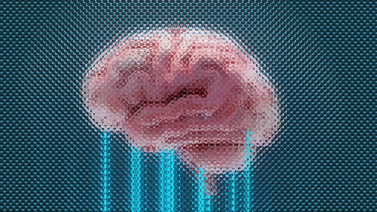 Une photo flou d'une représentation d'un cerveau en image sur fond bleu