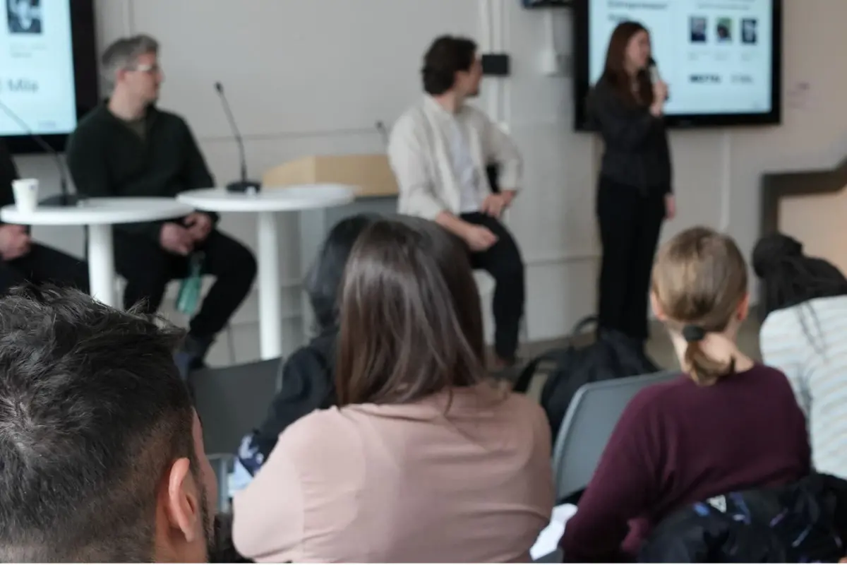 Picture of people attending a panel of experts