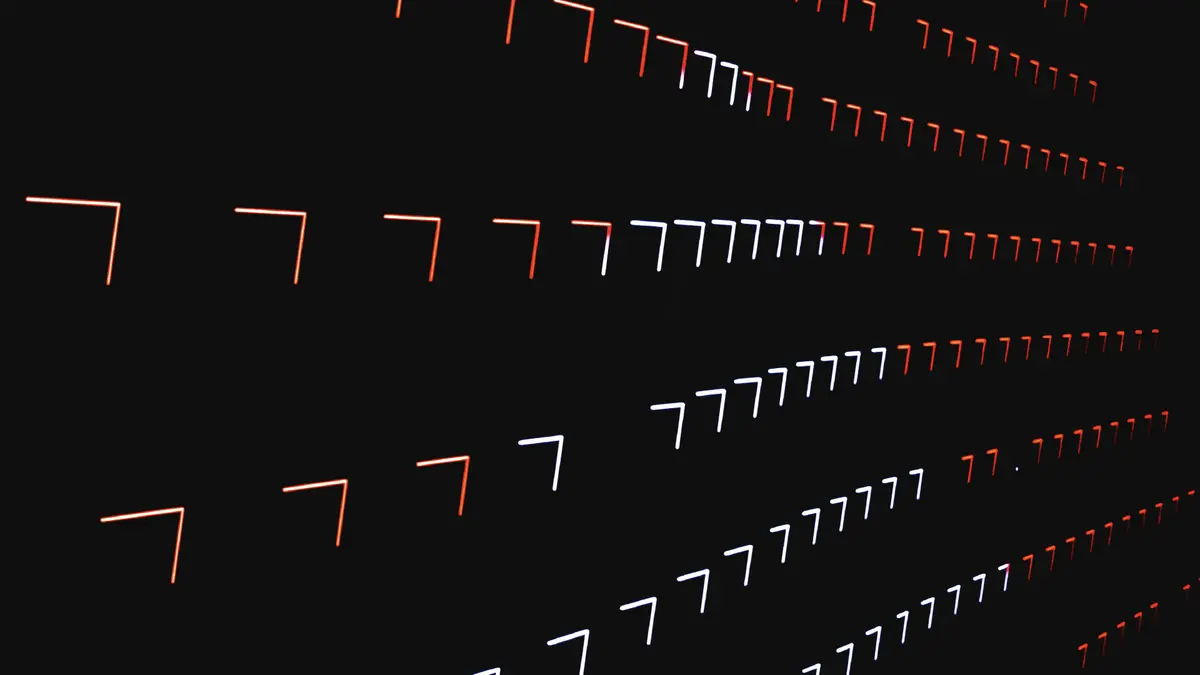 a black background with red and white squares