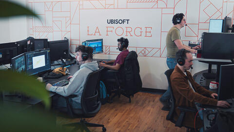 People working at their computers in the Ubisoft Laforge offices.