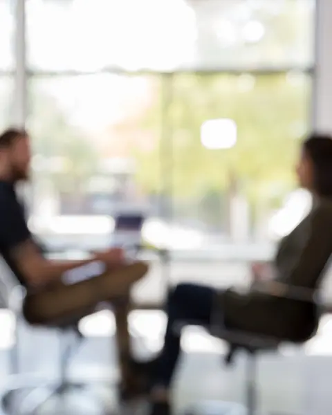 Two persons during a private conversation. 