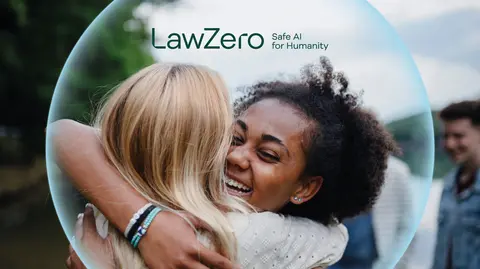 Two women hugging each other. 