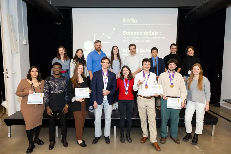 Photo de groupe de tous les participants et organisateurs du concours Mila Speed Science