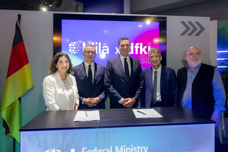 Group picture of Valerie Pisano and CEO of DFKI