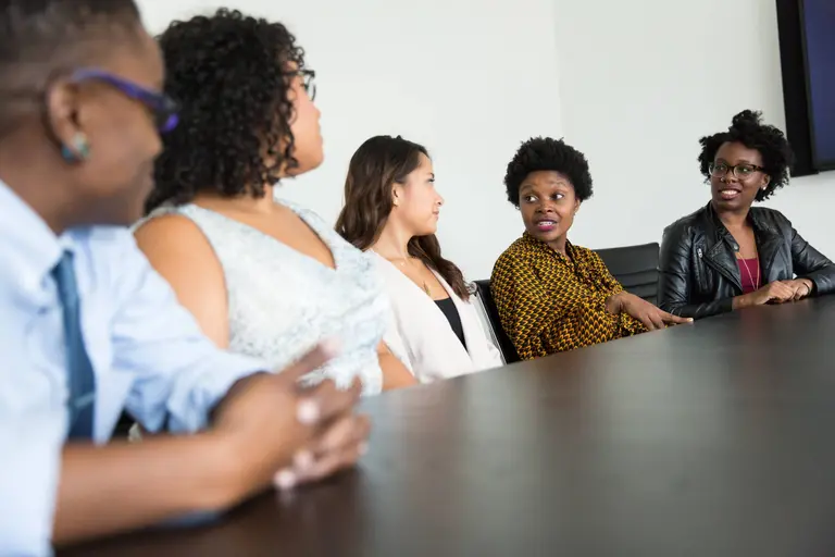 Picture of five recipients of the EDI Scholarships program sitting together