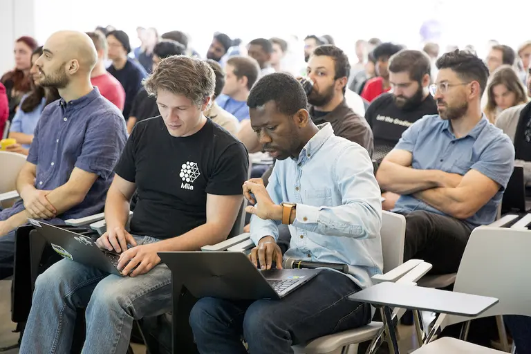 Room filled with participants of the Summer School of AI and human rights
