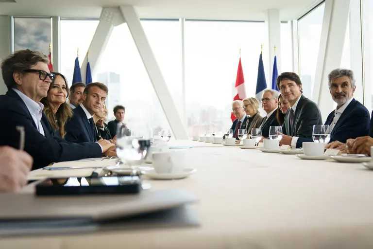 Yoshua Bengio and Valérie Pisano at Macron-Trudeau luncheon. 
