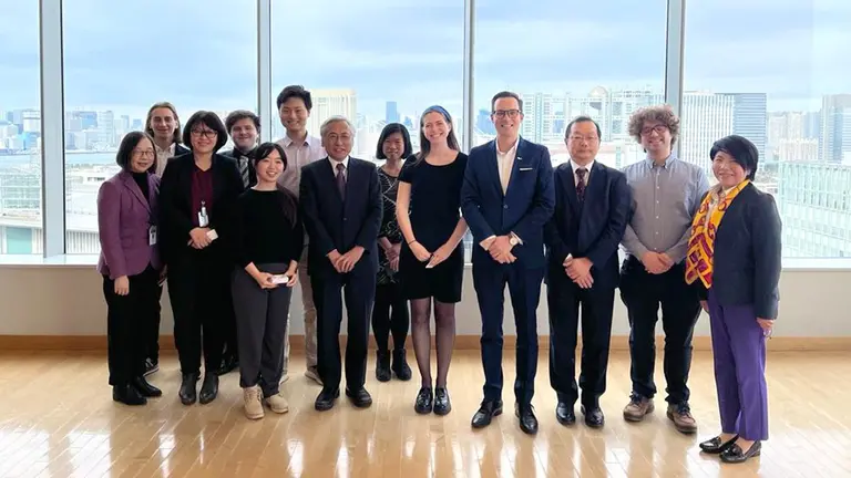 Group photo of the Mila delegation in Japan. 