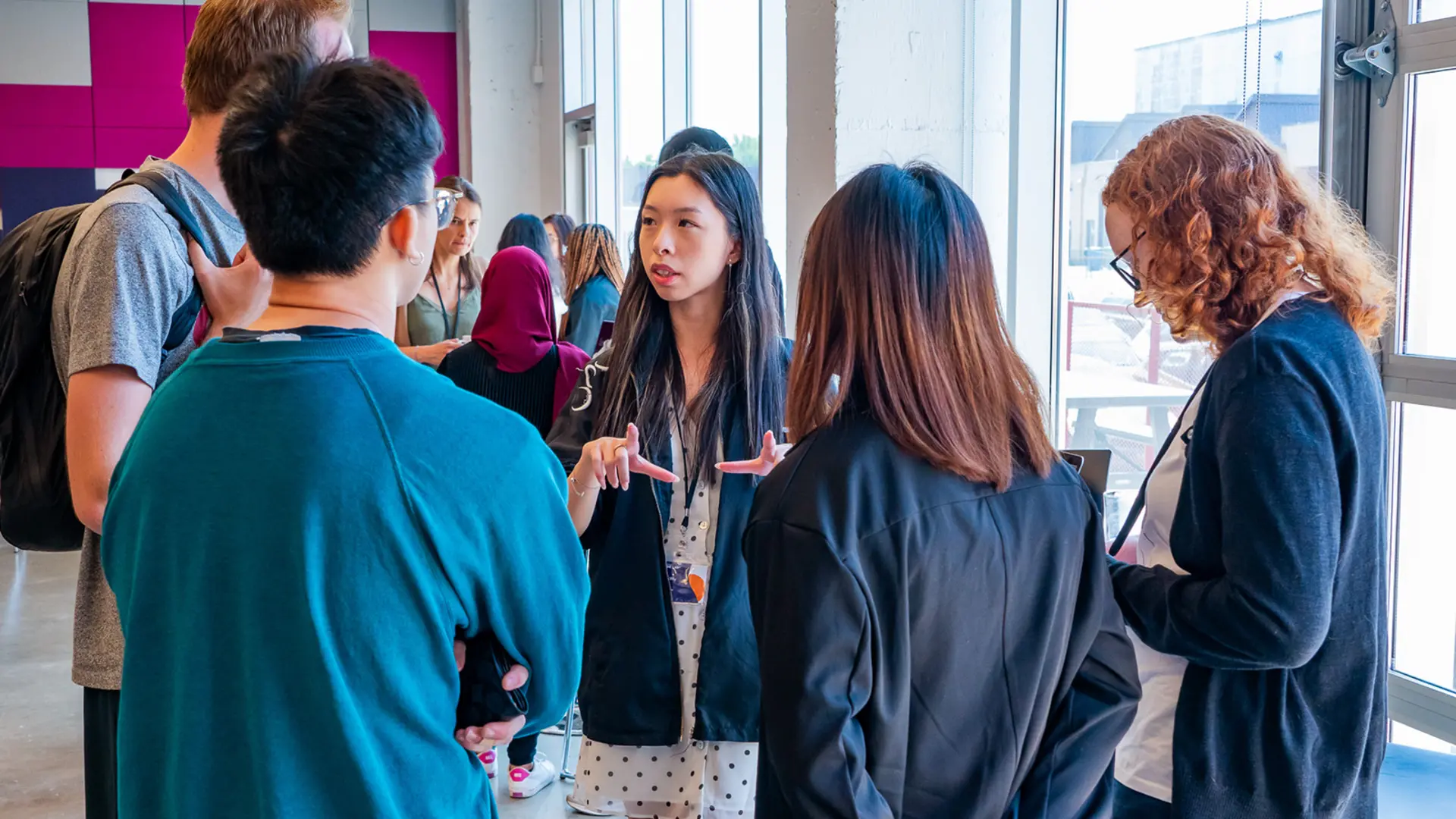 Participants of the AI4Good lab discussing together.