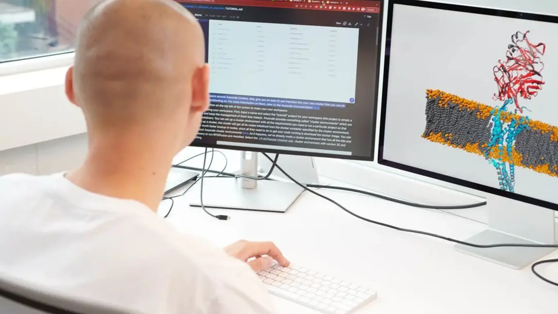 A Dreamfold employee working at his computer.