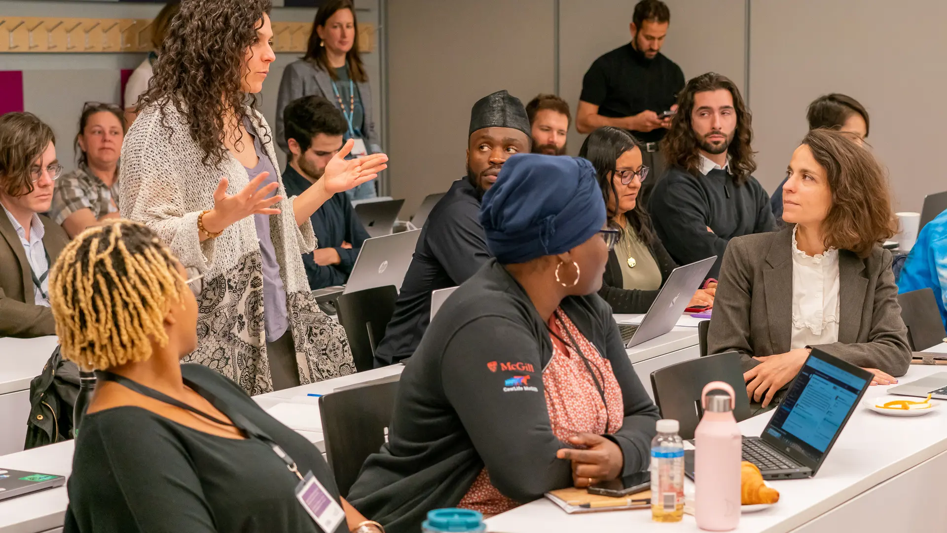 Summer school participants discuss during a class session.