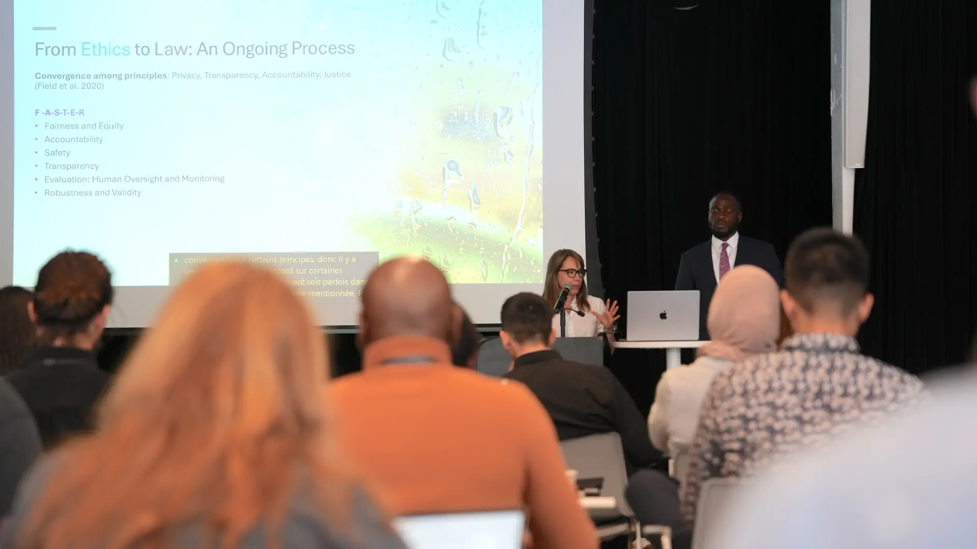 Catherine Regis giving a talk at the SSRAI