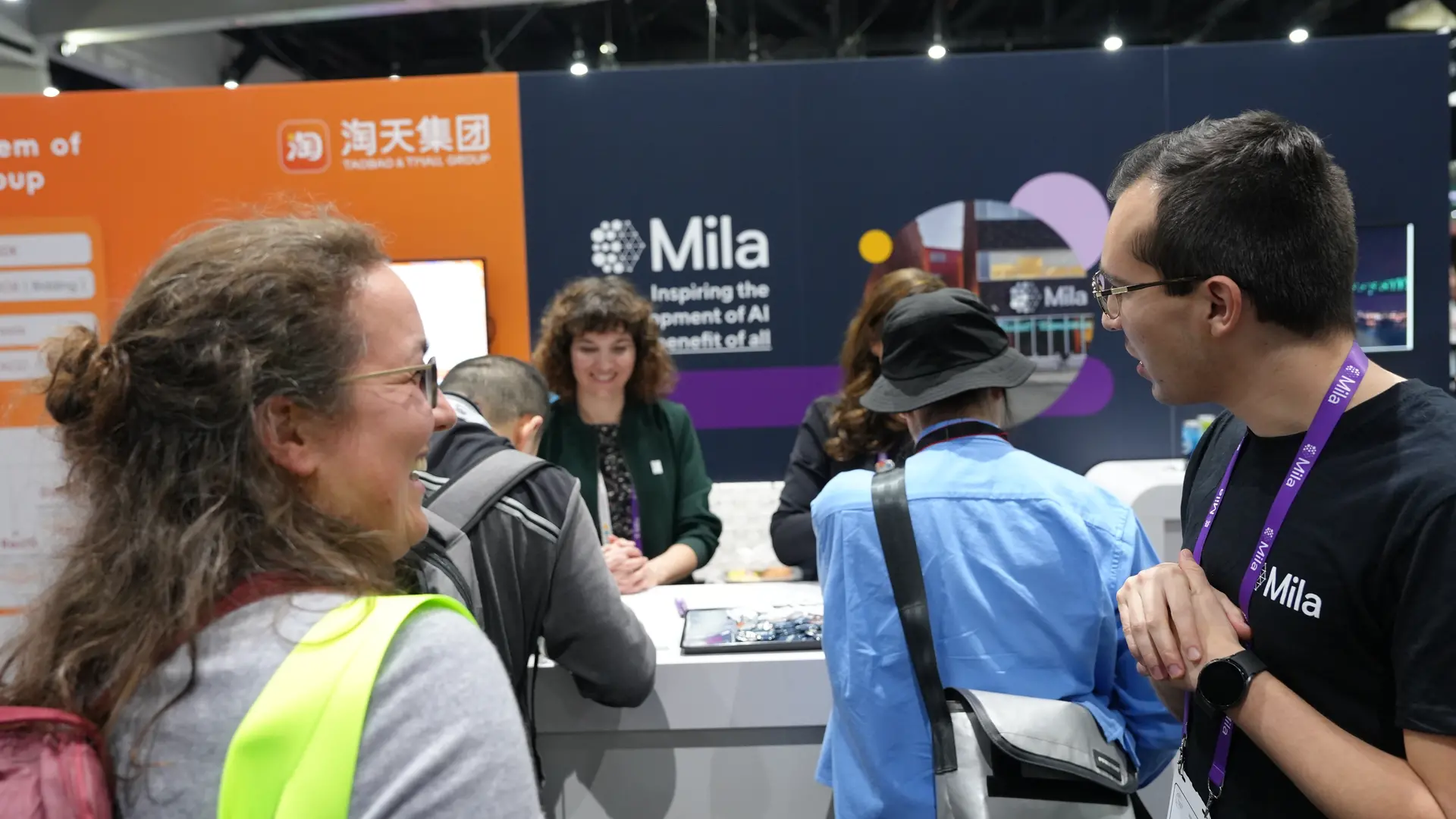Picture of Mila Booth at NeurIPS