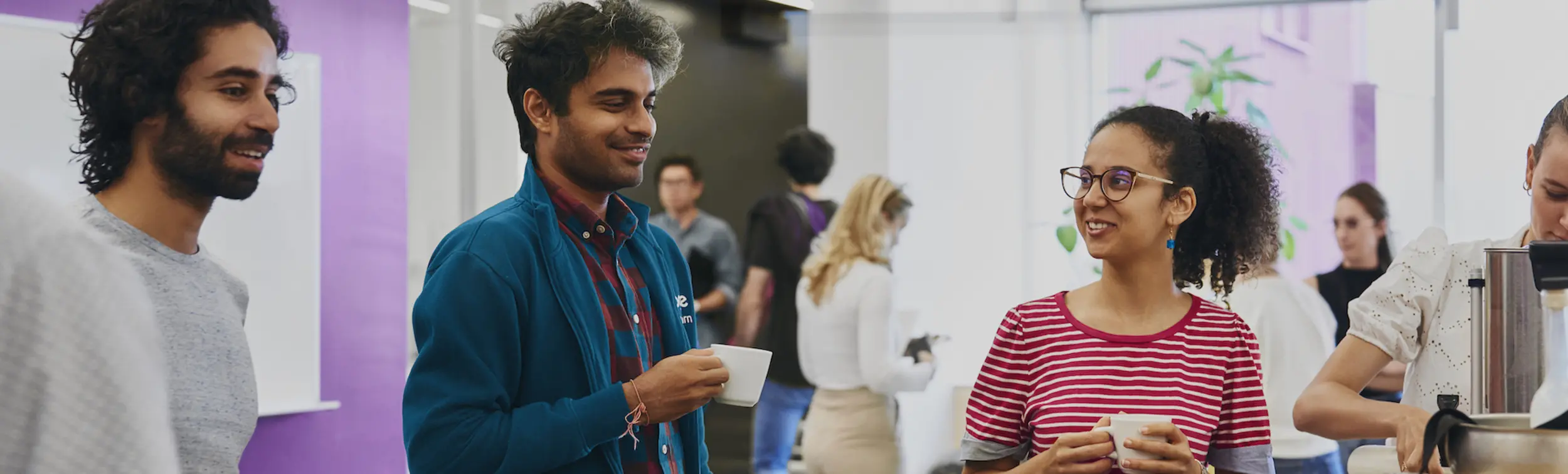 Students enjoying a coffee break in the lounge at Mila. 