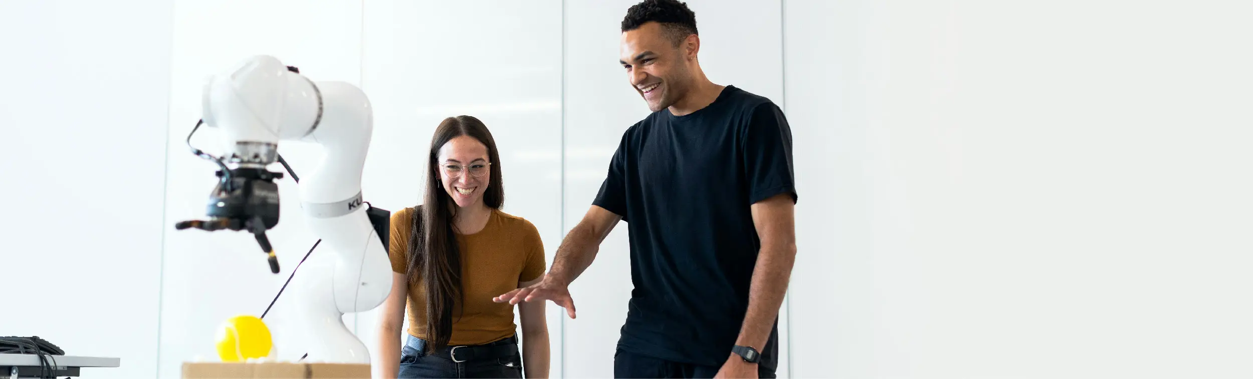 Engineers working with medical robotic equipment.