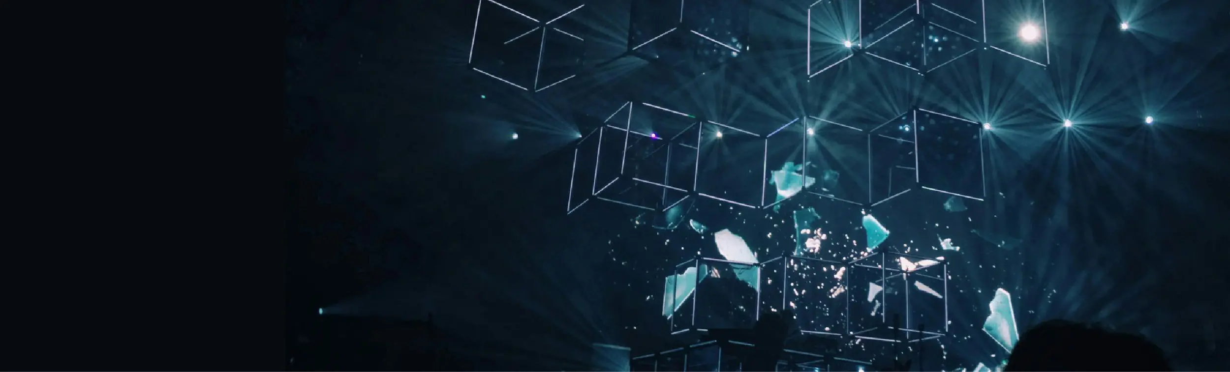 Geometric shapes on a dark blue background. 