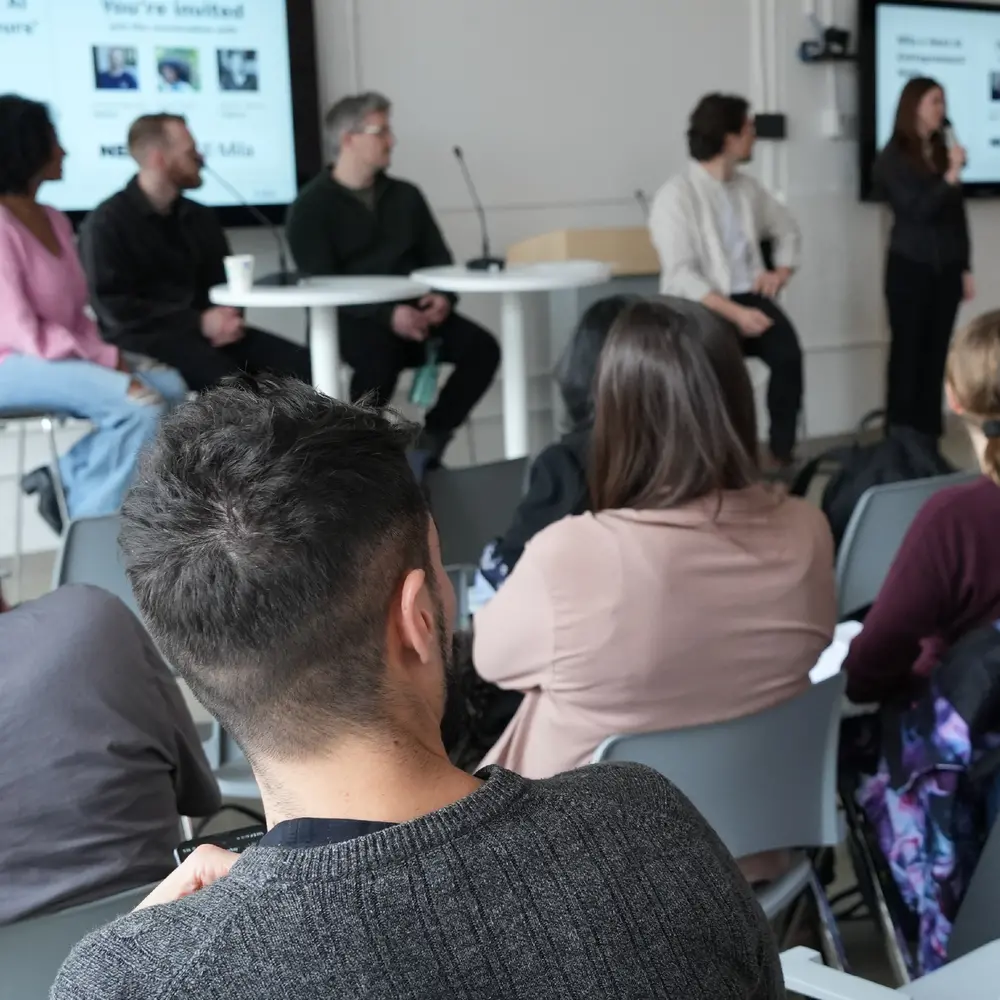 Picture of people attending a panel of experts