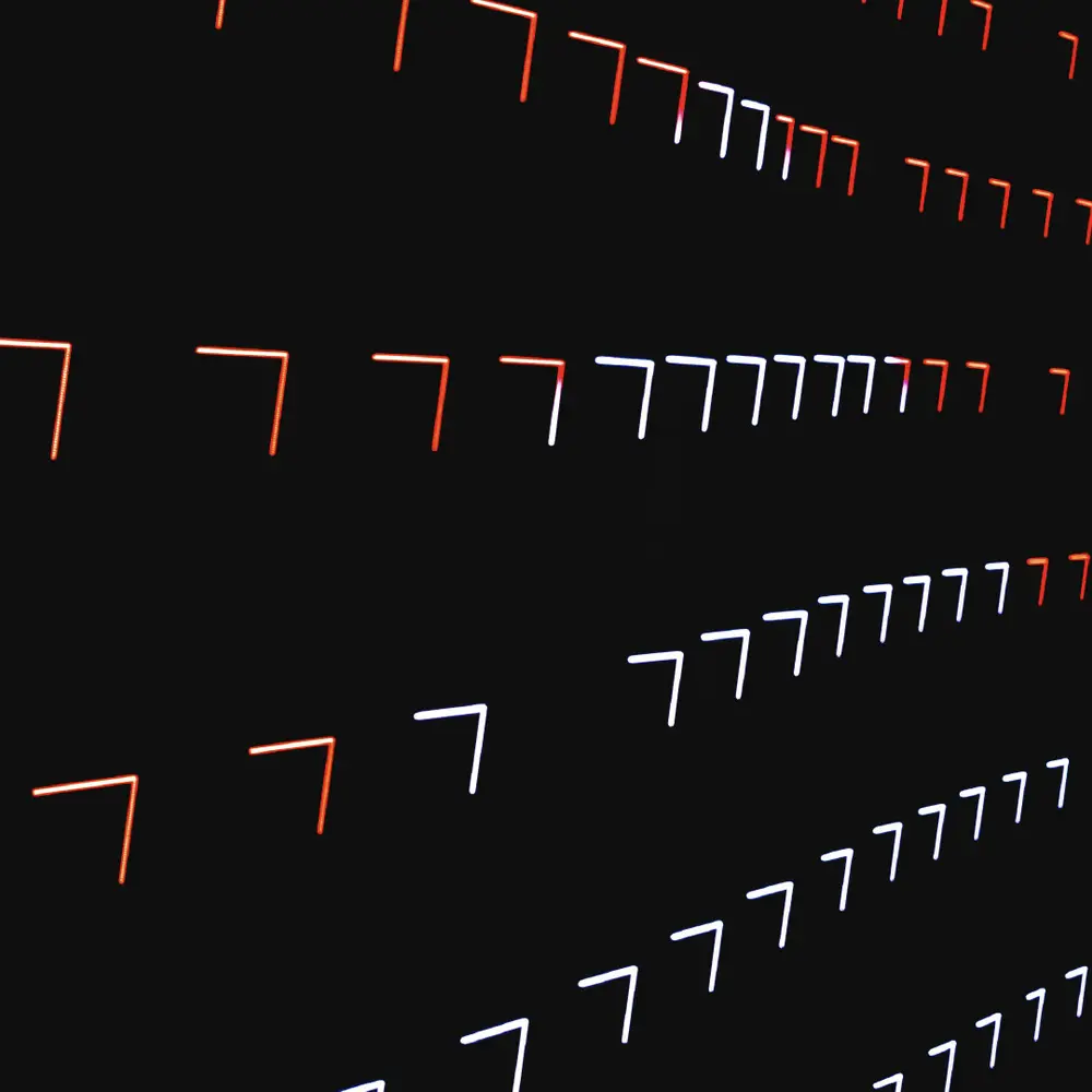 a black background with red and white squares