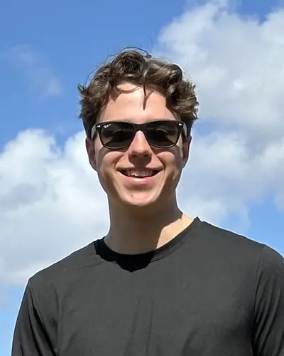 Portrait of Alex Aselstyne