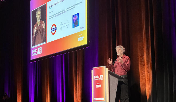 Yoshua Bengio on stage during World Summit AI conference