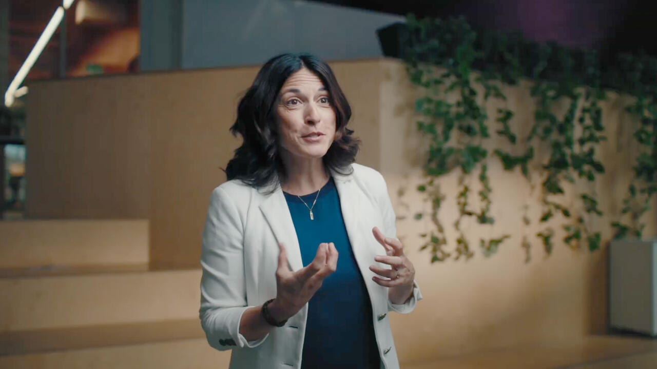 Photo of Valerie Pisano speaking to the camera. 